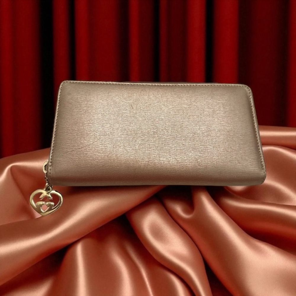 Gucci Gold Leather Long Zip Wallet w/ Heart Charm
